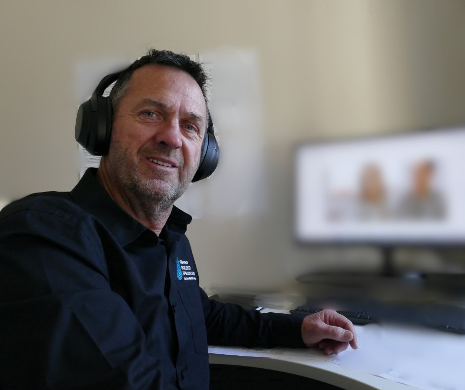 owner builder talking to clients